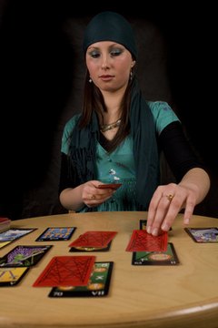 Giving an accurate tarot reading may convince others you're psychic.