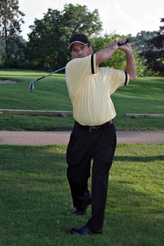 Men often wear knitted shirts and slacks with a roomy fit.