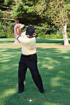 In a proper back swing, the shoulders rotate around the spine, instead of the lead shoulder.
