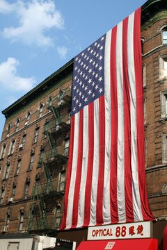 The American flag evokes deep patriotism and symbolizes many meanings.