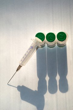 syringe image by Mykola Velychko from Fotolia.com Modern puppy immunization schedules are divided between core and non-core vaccines.