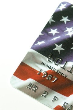 patriot credit card image by Ray Kasprzak from Fotolia.com Consumers need to consider the total borrowing costs of new and existing credit lines.