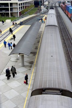morning commuters image by Aaron Kohr from Fotolia.com Taking public transportation saves money.