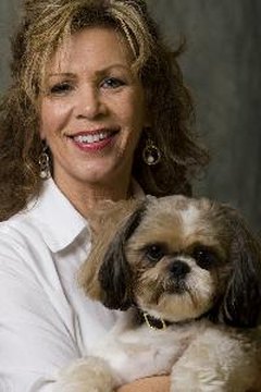Mature woman and her dog image by Mat Hayward from Fotolia.com Your best friend could suffer from dry skin.
