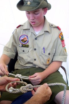Scouts test their knot-tying skills in scouting games.