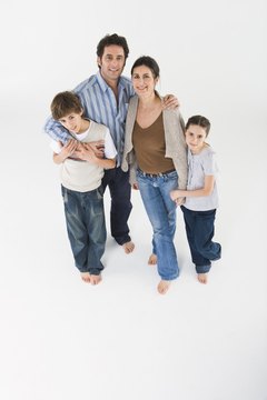 Jupiterimages/Polka Dot/Getty Images Marriage and family therapists help families cope with problems.