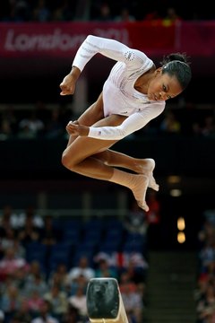 Ronald Martinez/Getty Images Sport/Getty Images Strong legs help you balance on and leap off the beam.