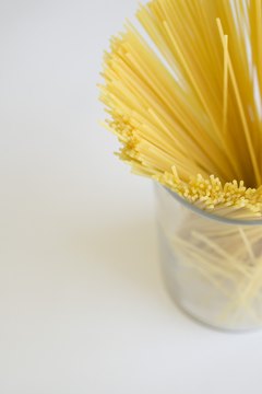 Creatas Images/Creatas/Getty Images Spaghetti noodles are a good source of B vitamins.
