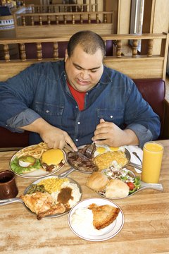 Jupiterimages/Comstock/Getty Images An increase in total calorie consumption over the past 40 years has contributed to growing rates of obesity.