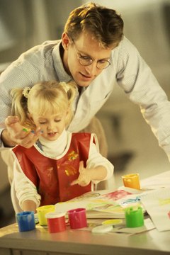 Tracing letters in finger paint helps reinforce sight word recognition.