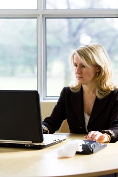 Jupiterimages/Photos.com/Getty Images Admissions advisers help students enter the school of their choice.