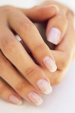 Goodshoot/Goodshoot/Getty Images Diet impacts fingernail appearance.