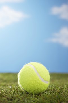 Martin Poole/Photodisc/Getty Images Fresh tennis balls bounce correctly and have a proper nap.