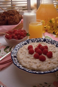 Jupiterimages/Comstock/Getty Images A big bowl of oats keeps your daily fiber intake on track.