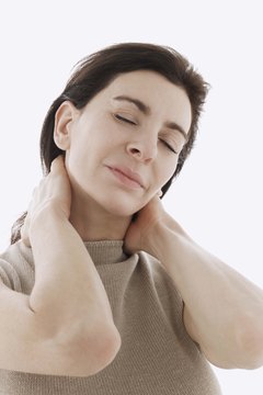 Jupiterimages/Comstock/Getty Images Yoga may help ease your aching neck and shoulders.