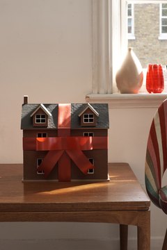 Martin Poole/Lifesize/Getty Images An affordable mortgage is key to getting into your dream house.