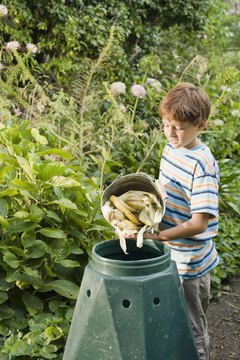 Jupiterimages/Pixland/Getty Images Adding fresh waste lengthens the time until the compost is ready.