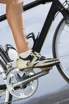 Polka Dot Images/Polka Dot/Getty Images Proper foot placement and ankle rotation can make you a more efficient rider
