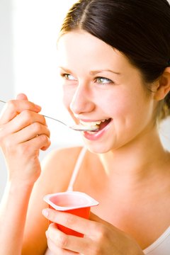 Jupiterimages/Photos.com/Getty Images Yogurt is a good source of calcium and protein.