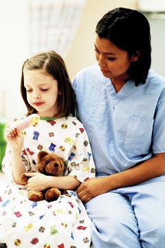 Ablestock.com/AbleStock.com/Getty Images Pediatric cancer patients often need emotional support from their nurses.