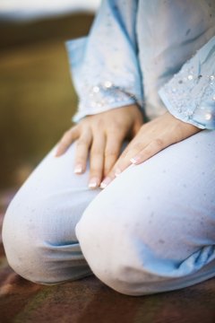 Brand X Pictures/Brand X Pictures/Getty Images Sitting on your heels with your knees bent overextends the knee and can cause joint problems.