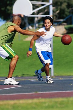 Stockbyte/Stockbyte/Getty Images Agility is important for being able to defend your player in basketball.