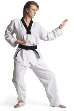 Photodisc/Photodisc/Getty Images Karate training builds confidence along with physical power.