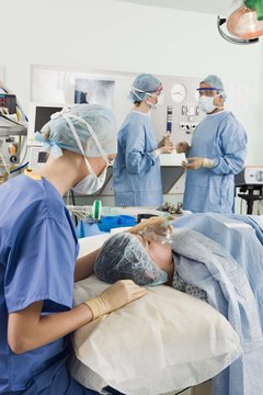 Jupiterimages/Polka Dot/Getty Images Anesthesia may be given by a doctor or a specially trained nurse called a certified registered nurse anesthetist.