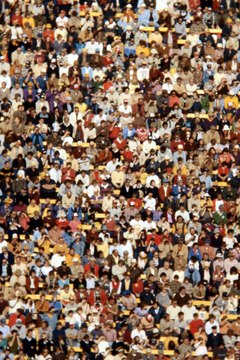 NA/Photos.com/Getty Images In large groups, the cost of insurance goes down.