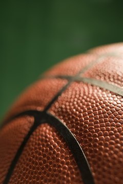 BananaStock/BananaStock/Getty Images Develop your basketball coordination with drills done in the house.