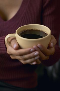 Jupiterimages/Comstock/Getty Images Coffee contains antioxidant properties.