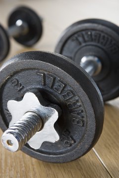BananaStock/BananaStock/Getty Images A dumbbell is most commonly used for single leg deadlift row.