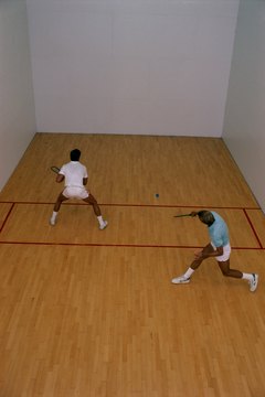 Jupiterimages/Photos.com/Getty Images Racquetball courts provide a small amount of space, but you cover a lot of ground.