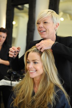 Michael Caulfield/Getty Images Entertainment/Getty Images Stylist to the stars, Tabatha Coffey, works on Denise Richards' hair.