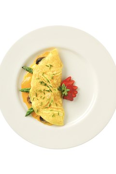 Thinkstock/Comstock/Getty Images Traditional omelets have far more fat than egg-white omelets.