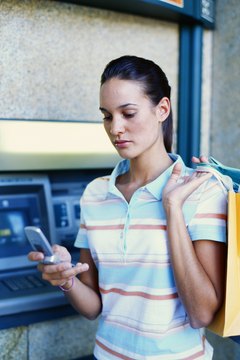 Stockbyte/Stockbyte/Getty Images Call your lender to try to work out a deal.