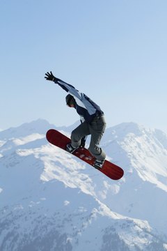 Jupiterimages/Comstock/Getty Images Different workouts train bodily responses needed for snowboarding.