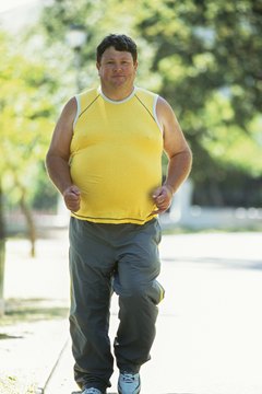 Stockbyte/Stockbyte/Getty Images Burn excess calories with regular runs.