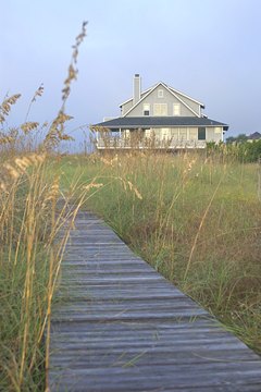 Jupiterimages/Comstock/Getty Images You don't need tax write-offs for a main home to write off vacation home items.