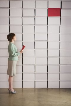 Brand X Pictures/Brand X Pictures/Getty Images Keep your boxes orderly while watching your storage units.