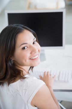 Jupiterimages/Photos.com/Getty Images Data entry operators key or scan information into computers.