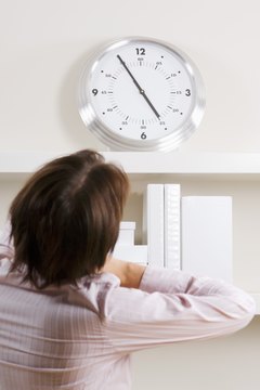 Pixland/Pixland/Getty Images Tardiness impacts everyone in the office.