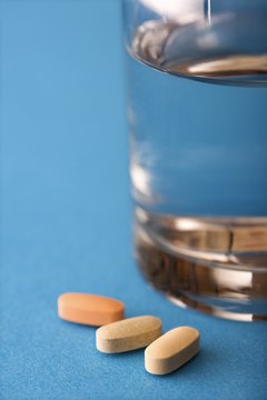 Thinkstock/Comstock/Getty Images Multivitamins can help boost your health.