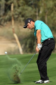 As Paul Casey demonstrates at Dubai, ground conditions may keep your divot from being a single strip of turf.