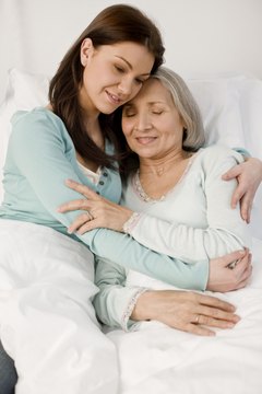 Creatas Images/Creatas/Getty Images Mom will appreciate your willingness to help her.