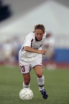 Andy Lyons/Getty Images Sport/Getty Images Kristine Lilly puts her whole body into a strong run against Finland.