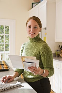 Jupiterimages/Comstock/Getty Images A personal profit and loss statement records your income and expenses for the month.