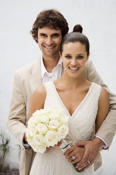 Jupiterimages/Goodshoot/Getty Images Newlyweds should consider estate planning.