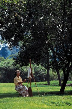 People participating in summer art programs surround themselves with inspirational material.
