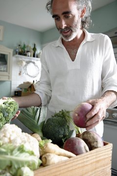 Andrew Hobbs/Lifesize/Getty Images Fresh vegetables are healthy and inexpensive in season.